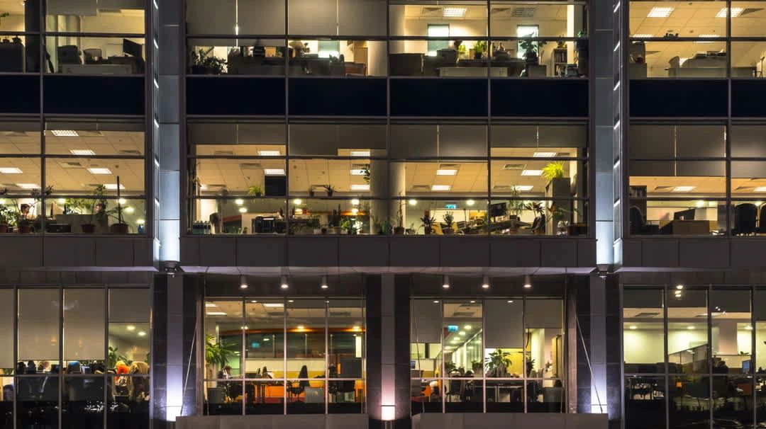 Office building lit up at night