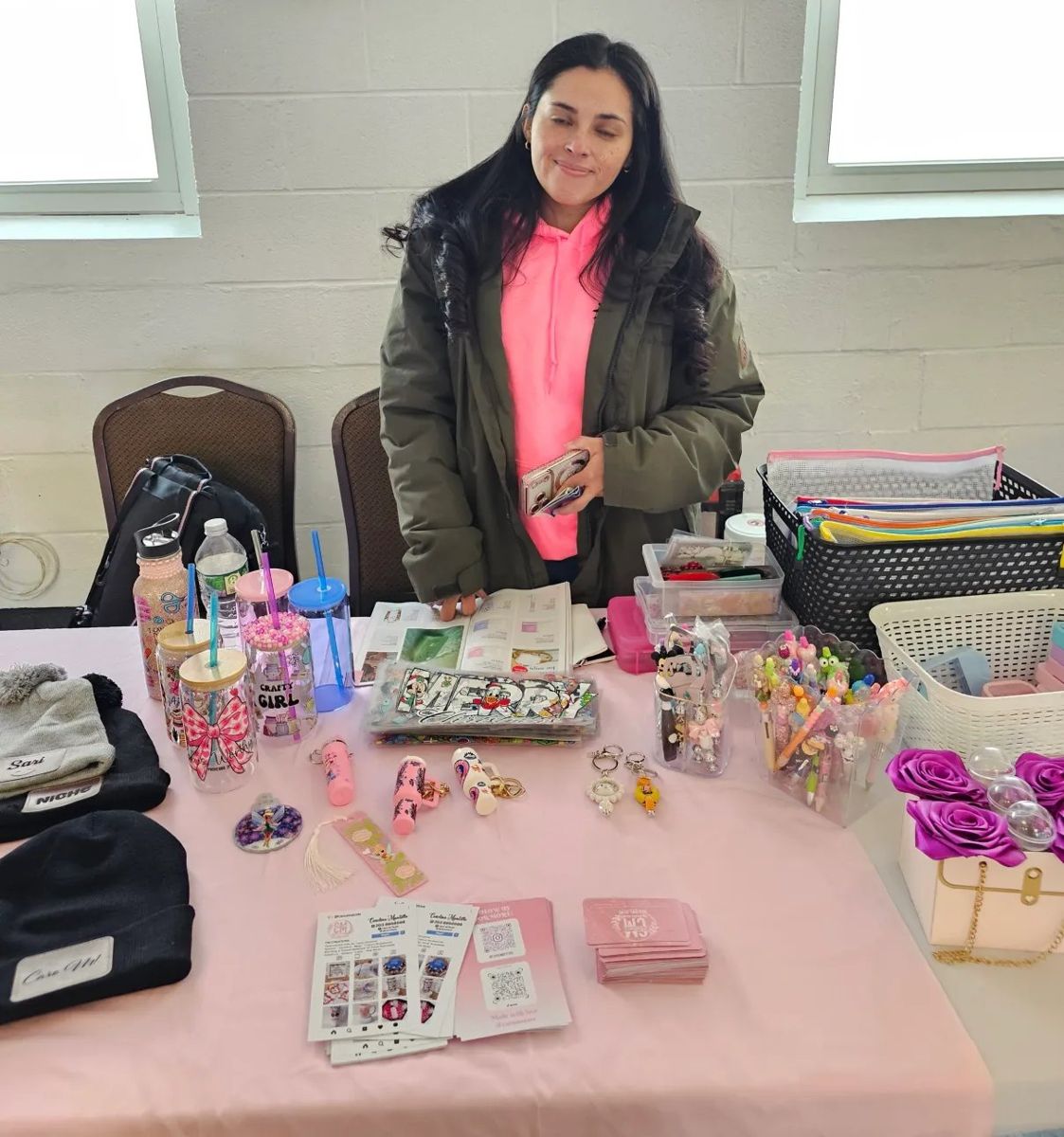 A crafts vendor at her table