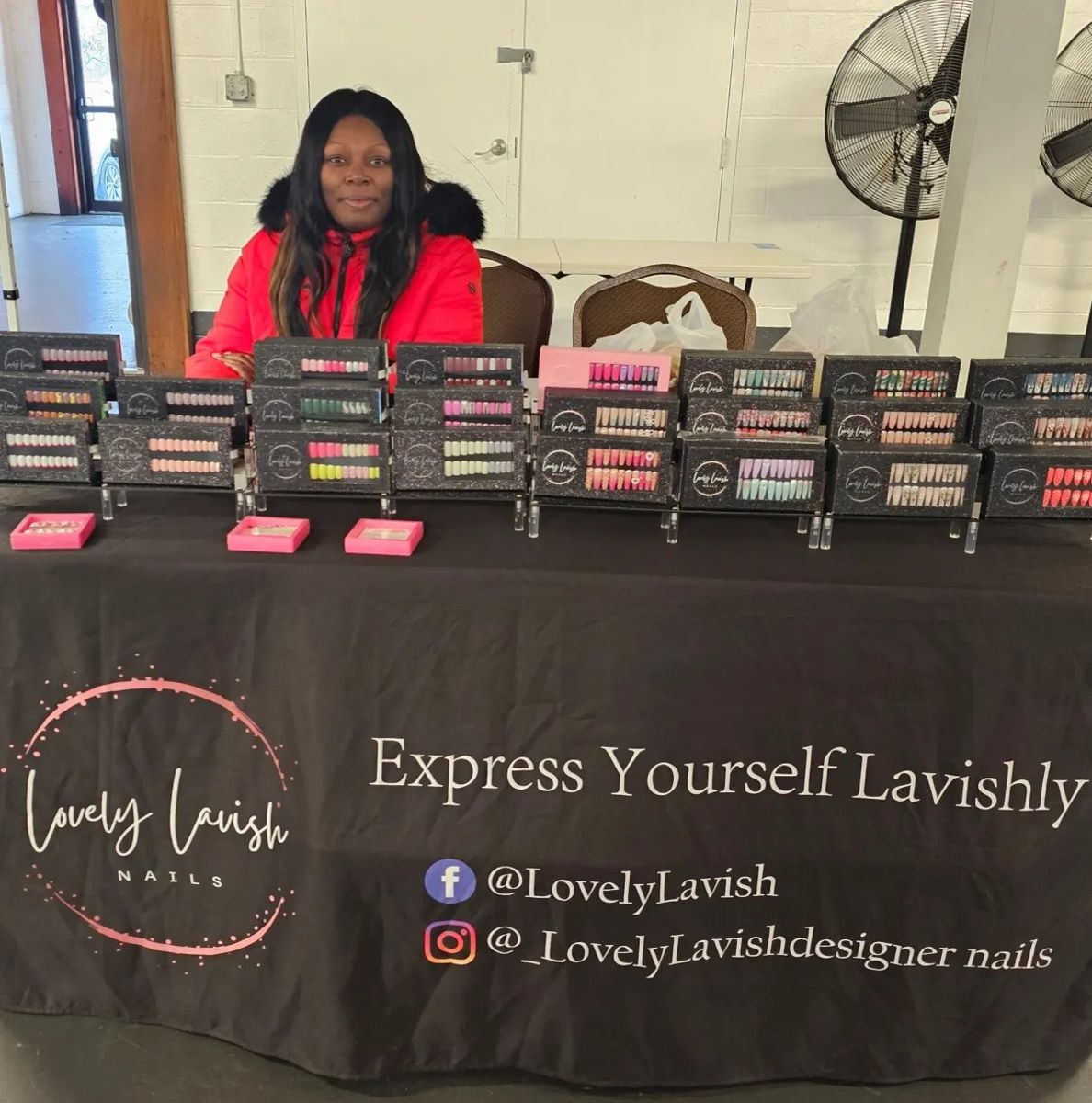 Lovely Lavish Nails vendor at her table
