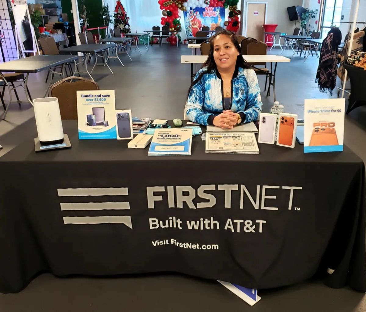 A FirstNet vendor at her table