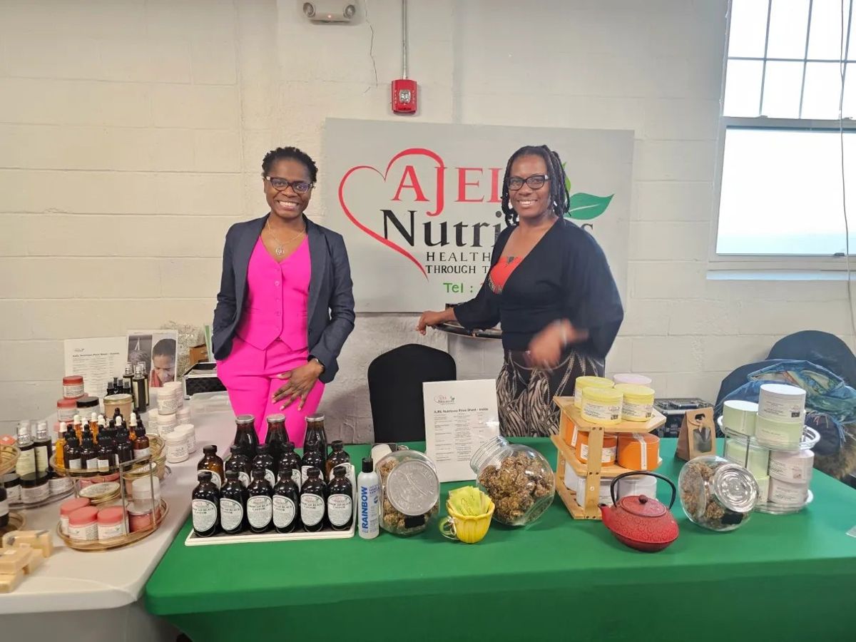 AJEL Nutrition vendors at their table