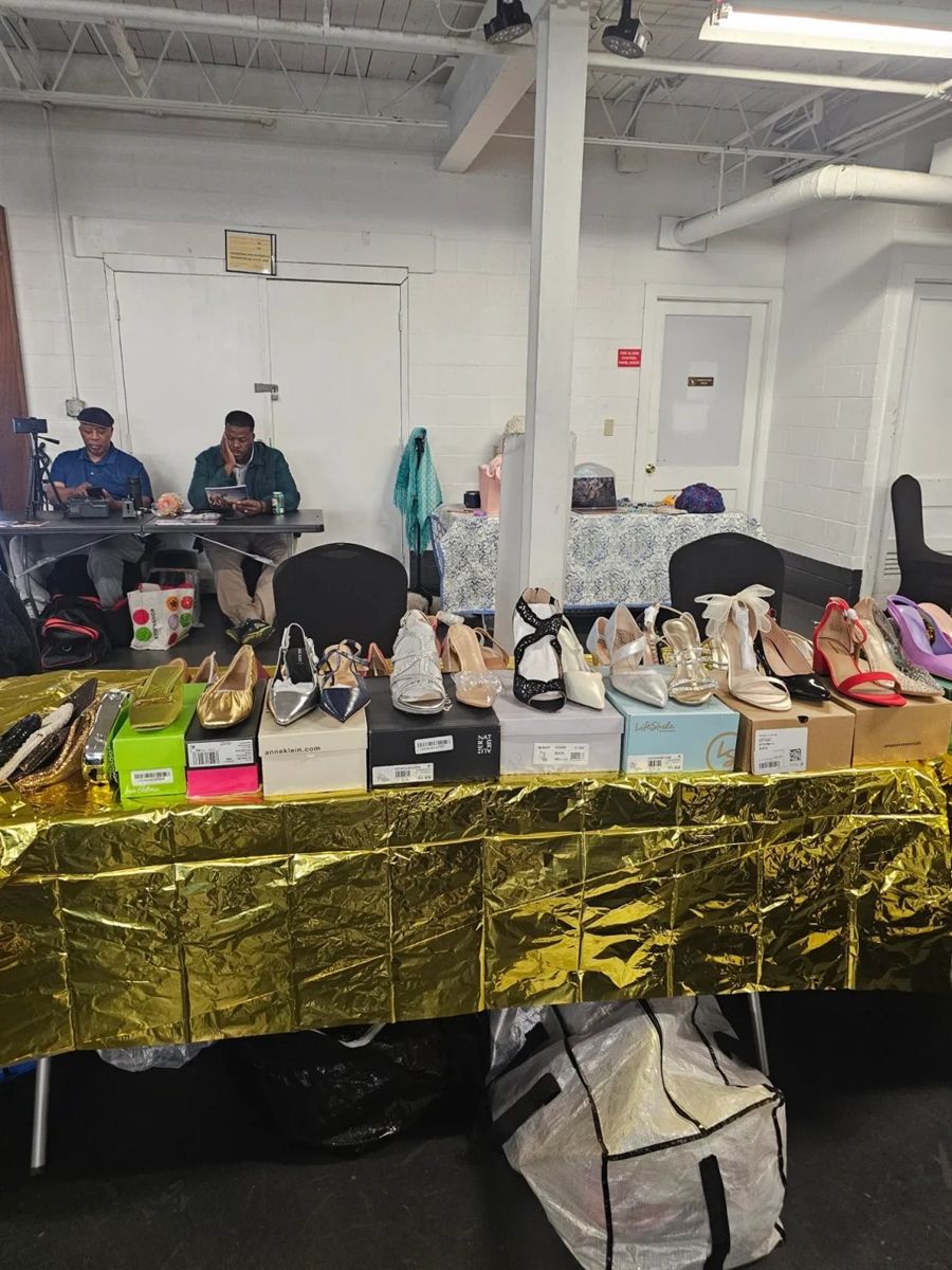 A vendor table of women's shoes